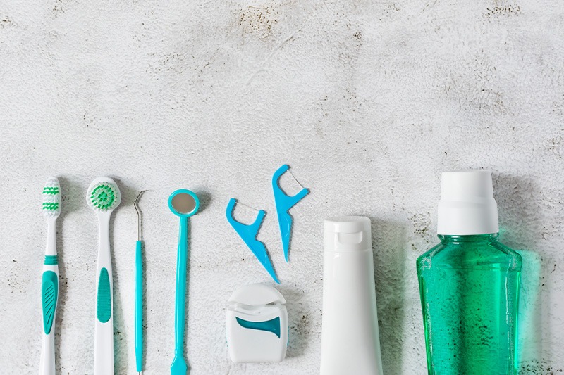 Oral hygiene tools arranged in straight line